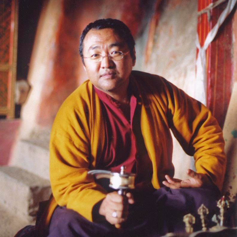 Jigme Tromge Rinpoche with Prayer Wheel Photo